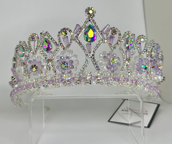 Silver crown/tiara with light purple crystals and iridescent stones