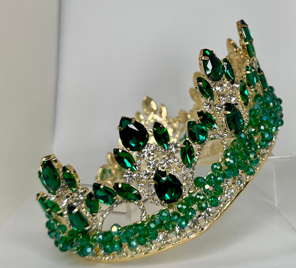 Gold crown/tiara with emerald green stones and crystals